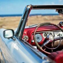 Foto behang Auto bij Strand 70071 Dutch Digiwall