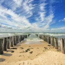 Foto behang Strandpalen Zeeland Holland 7504