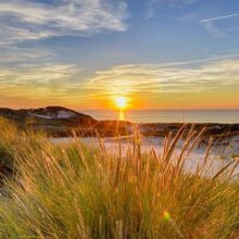 Foto behang Scheveningen zonsondergang Holland 8305