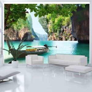 Fotobehang - Abandoned Boat - Tropical Landscape with a Boat amidst Rocky Cliffs
